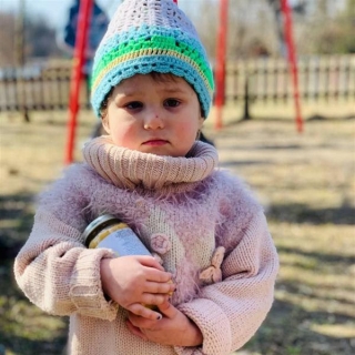 A child in Ukraine 90 days into the conflict